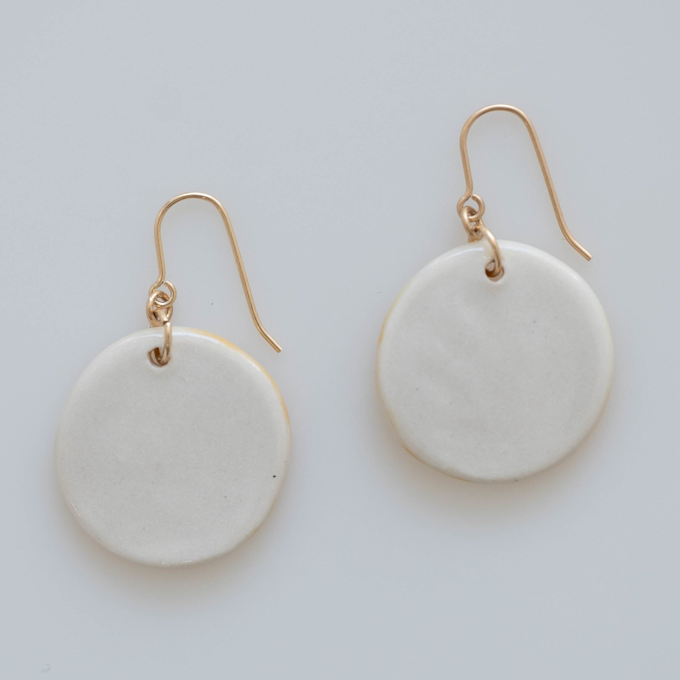 Back view circular floral earrings with hold ear wires