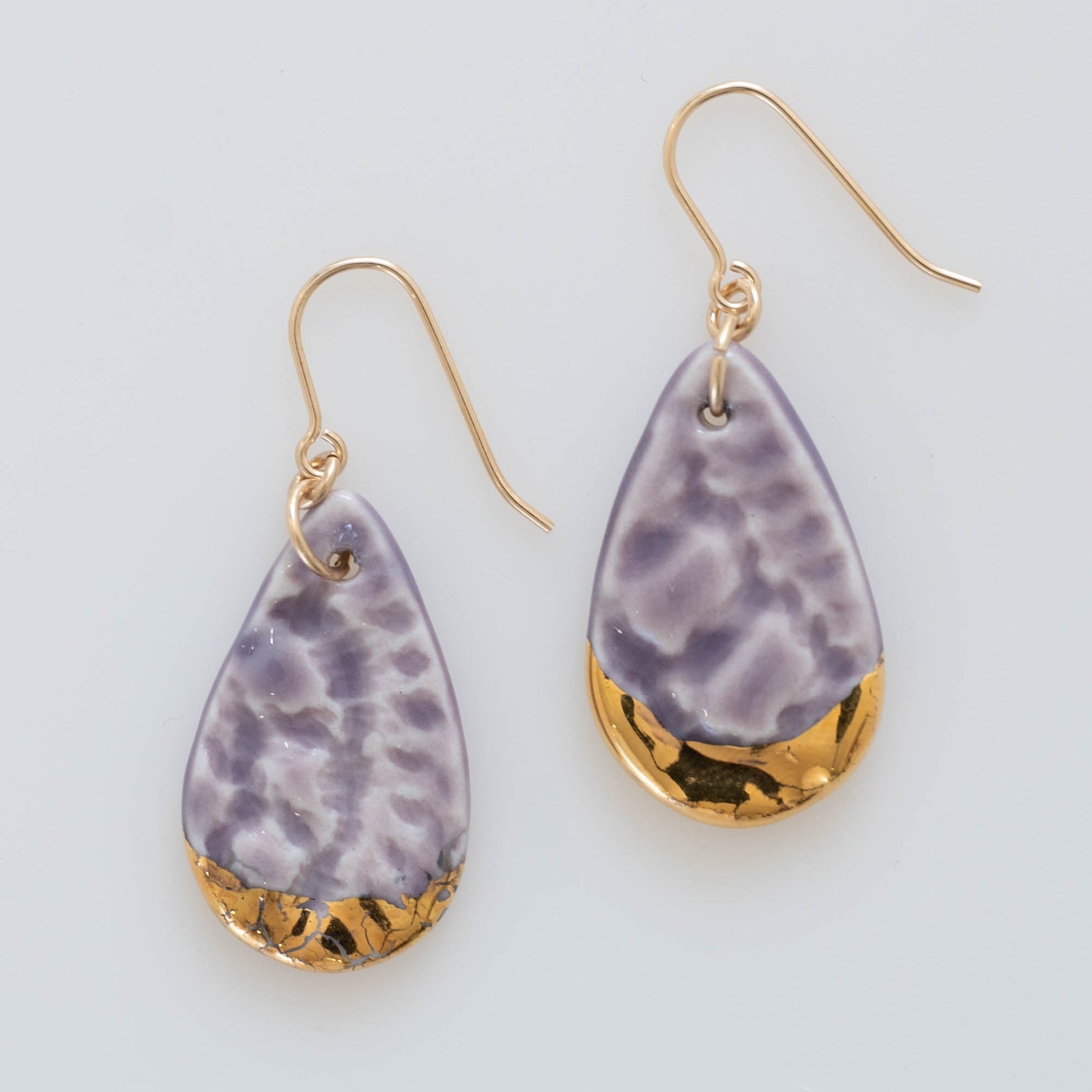 Lavender dangle earrings with gold accents