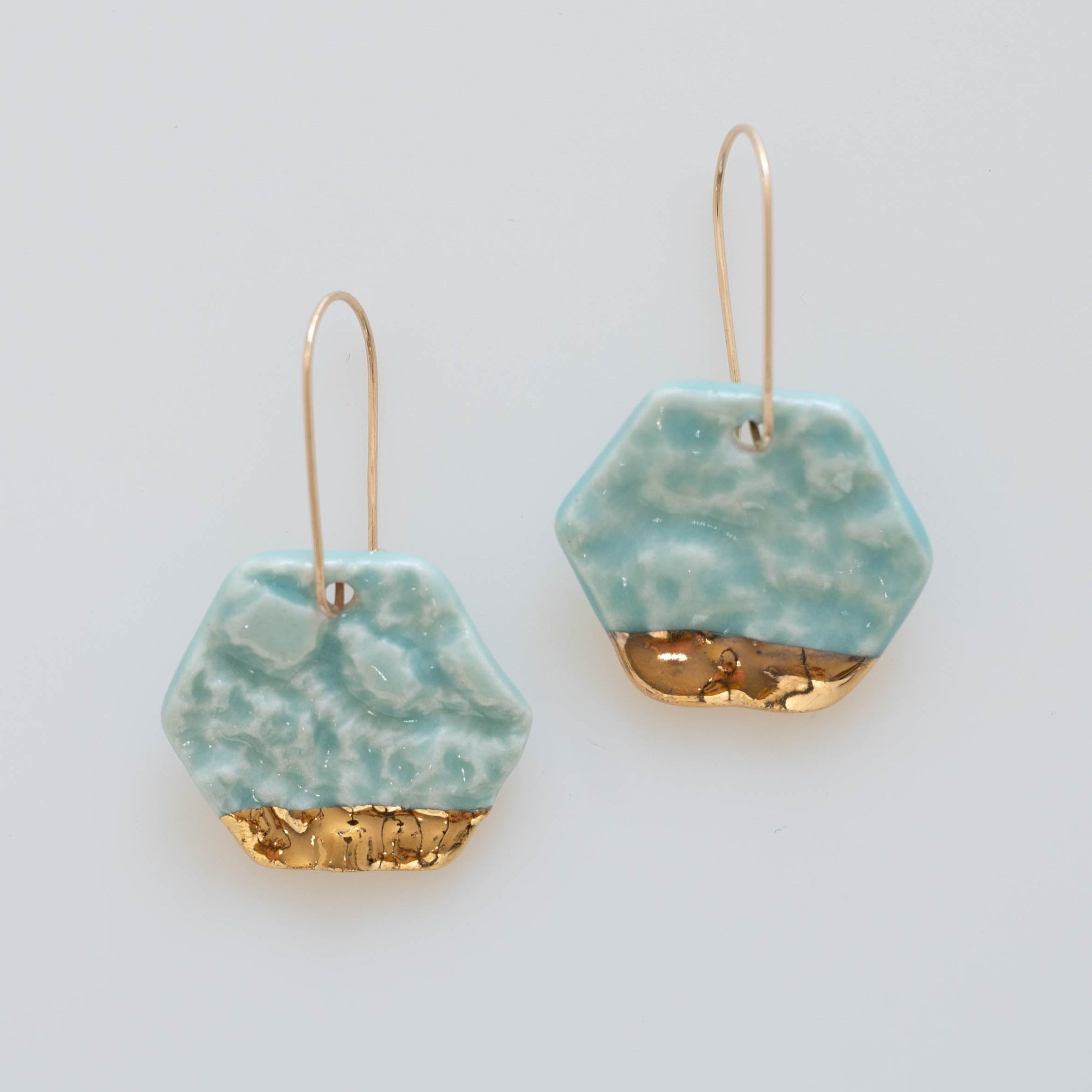 Aqua dangle earring with gold accents