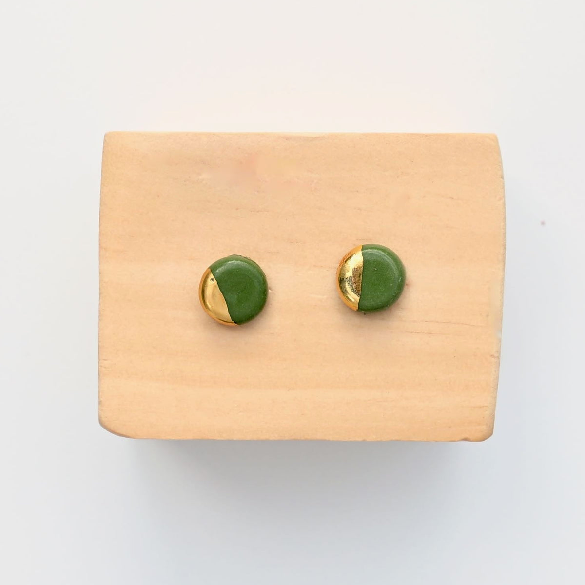 Handmade green porcelain Dot Stud earrings with gold luster by Hudson Ceramics