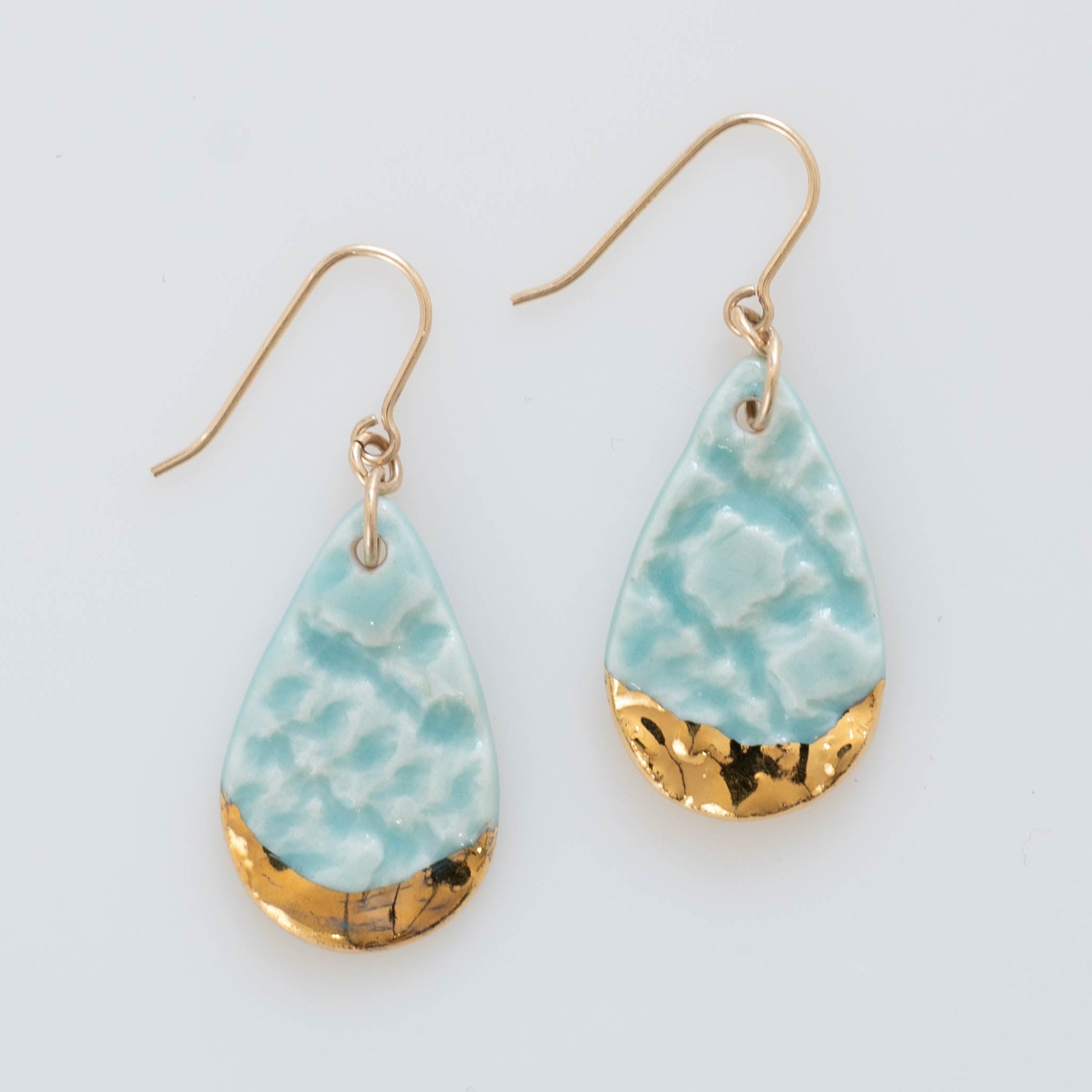 Aqua dangle earring with gold accents