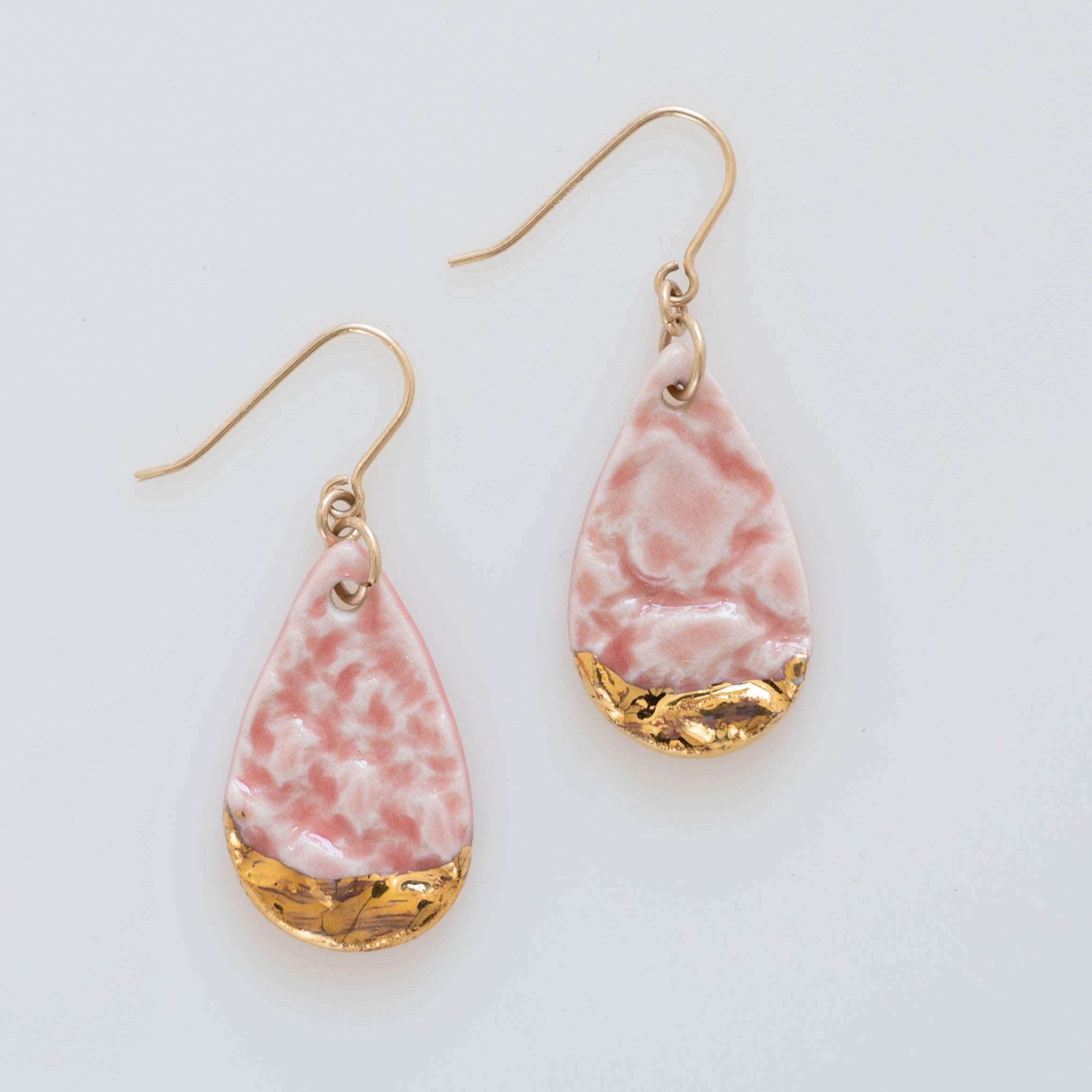 Pink dangle earring with gold accents